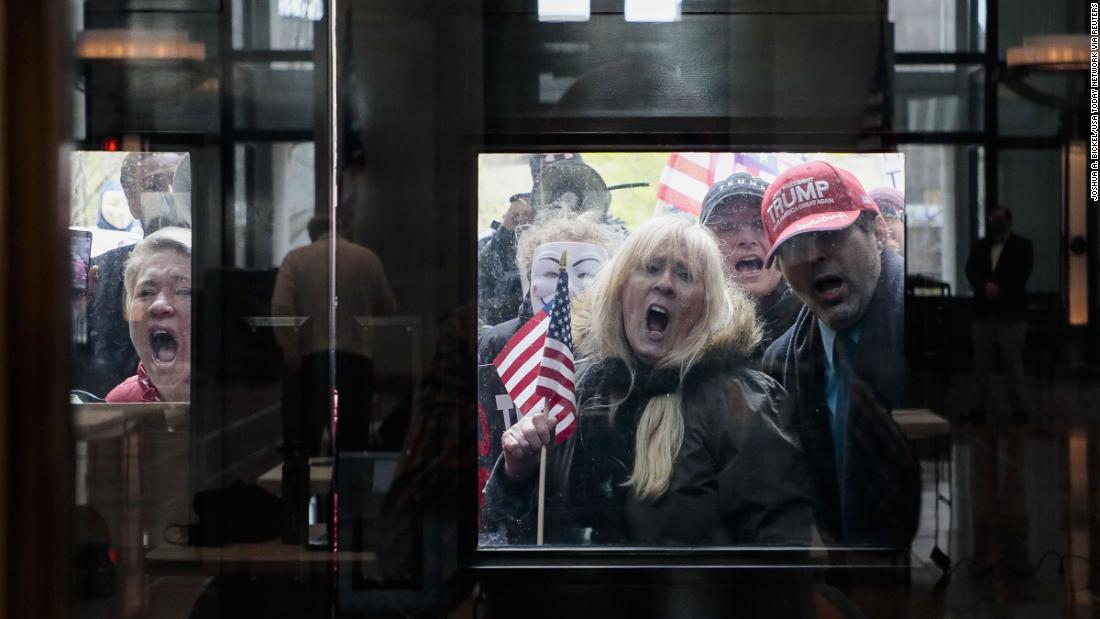 Protesters stand outside the Statehouse Atrium in Columbus, Ohio, on April 13, &lt;a href=&quot;https://www.cnn.com/2020/04/16/us/protests-coronavirus-stay-home-orders/index.html&quot; target=&quot;_blank&quot;&gt;to voice their opposition to stay-at-home orders.&lt;/a&gt; About 100 protesters assembled outside the building during Gov. Mike DeWine&#39;s weekday update on the state&#39;s response to the pandemic.